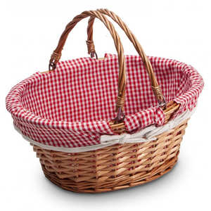 Natural wicker basket with two handles lined with red and white fabric from Vichy
