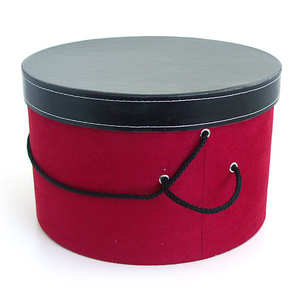 Red velvet hat box with black leather effect lid
